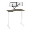 Bestar Viva 48W x 24D Electric Standing Desk with Monitor Arms in walnut grey